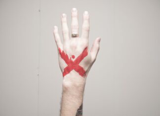 X-Lover left human hand with x mark